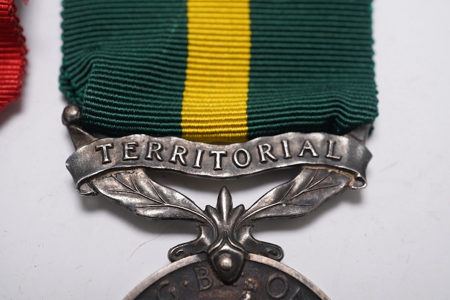 Three assorted service medals; Ed VII Volunteer Officer's Decoration hallmarked for 1905; GV Imperial Service medal to Walter Charles Cornish; GVI Territorial Efficiency medal to 2062789 . S/Sgt. L.W.Sergeant. R.A. Condi